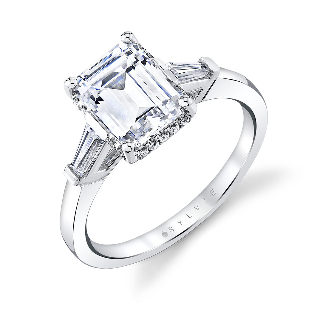 (18K White) Emerald Cut Three Stone Hidden Halo Engagement Ring - Karrigan