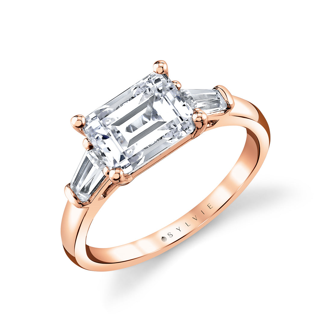 (18K Rose) East West Emerald Cut Three Stone Engagement Ring With Baguettes - Nicola