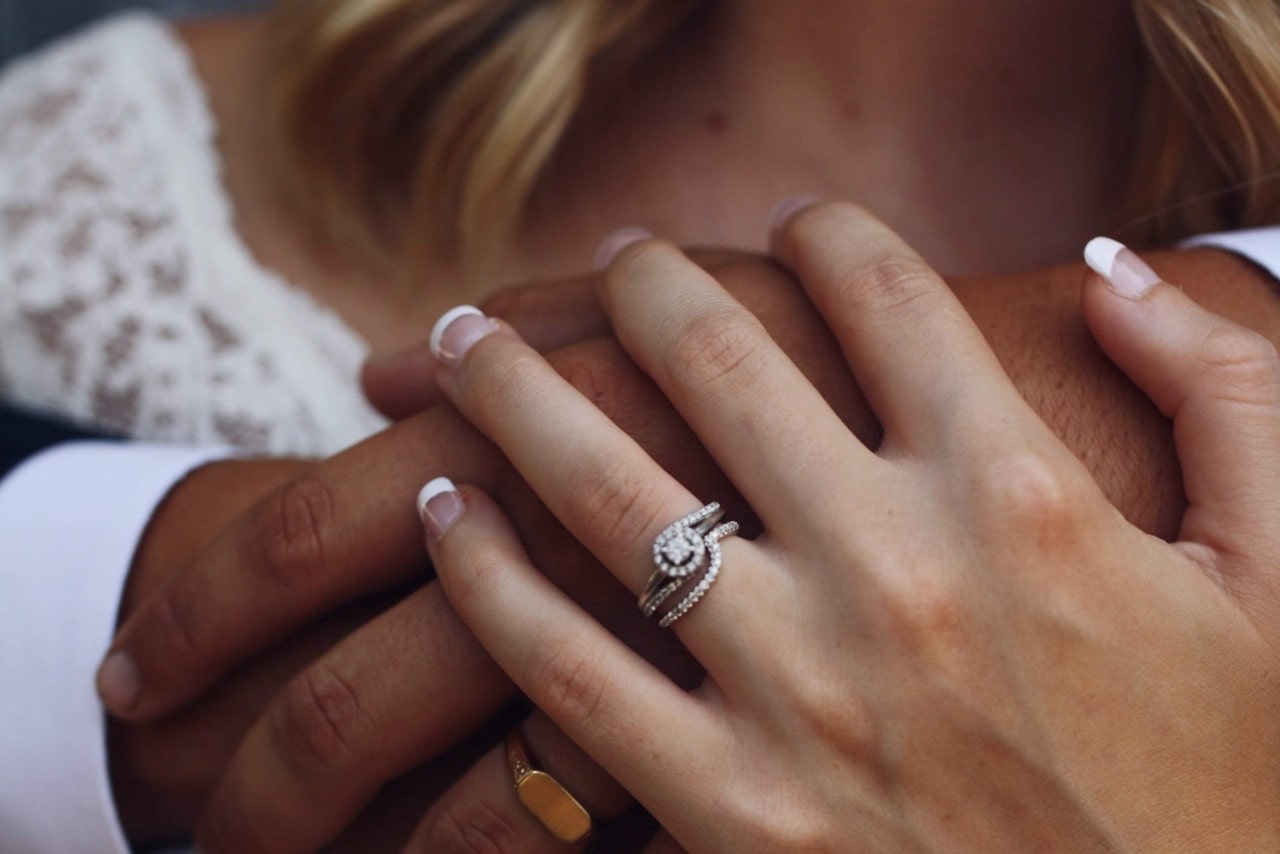 Bride wearing a fantastical round cut diamond ring
