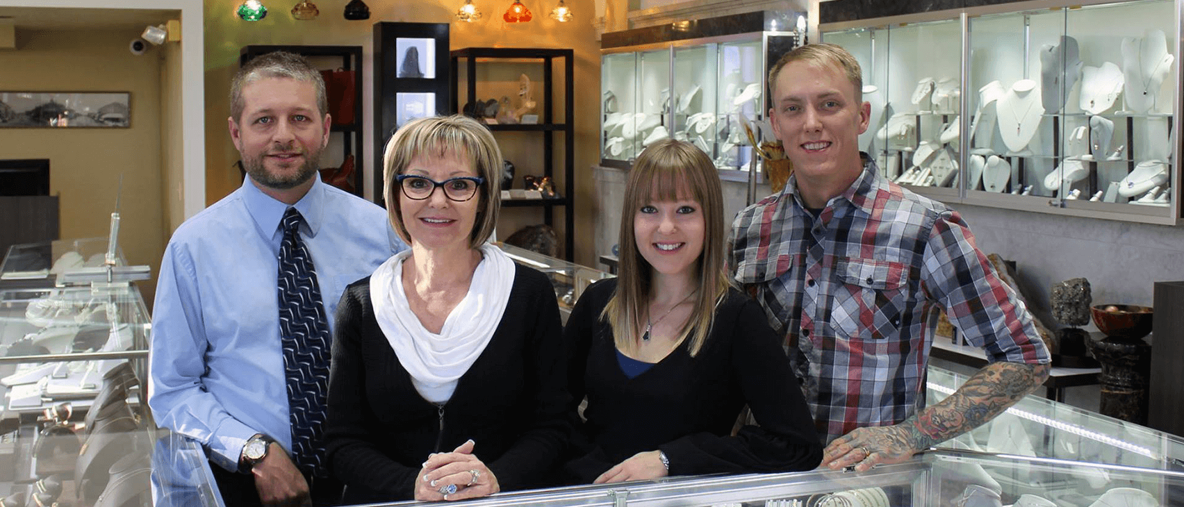 Photo of the Neugebauer's team in front of the store's interior